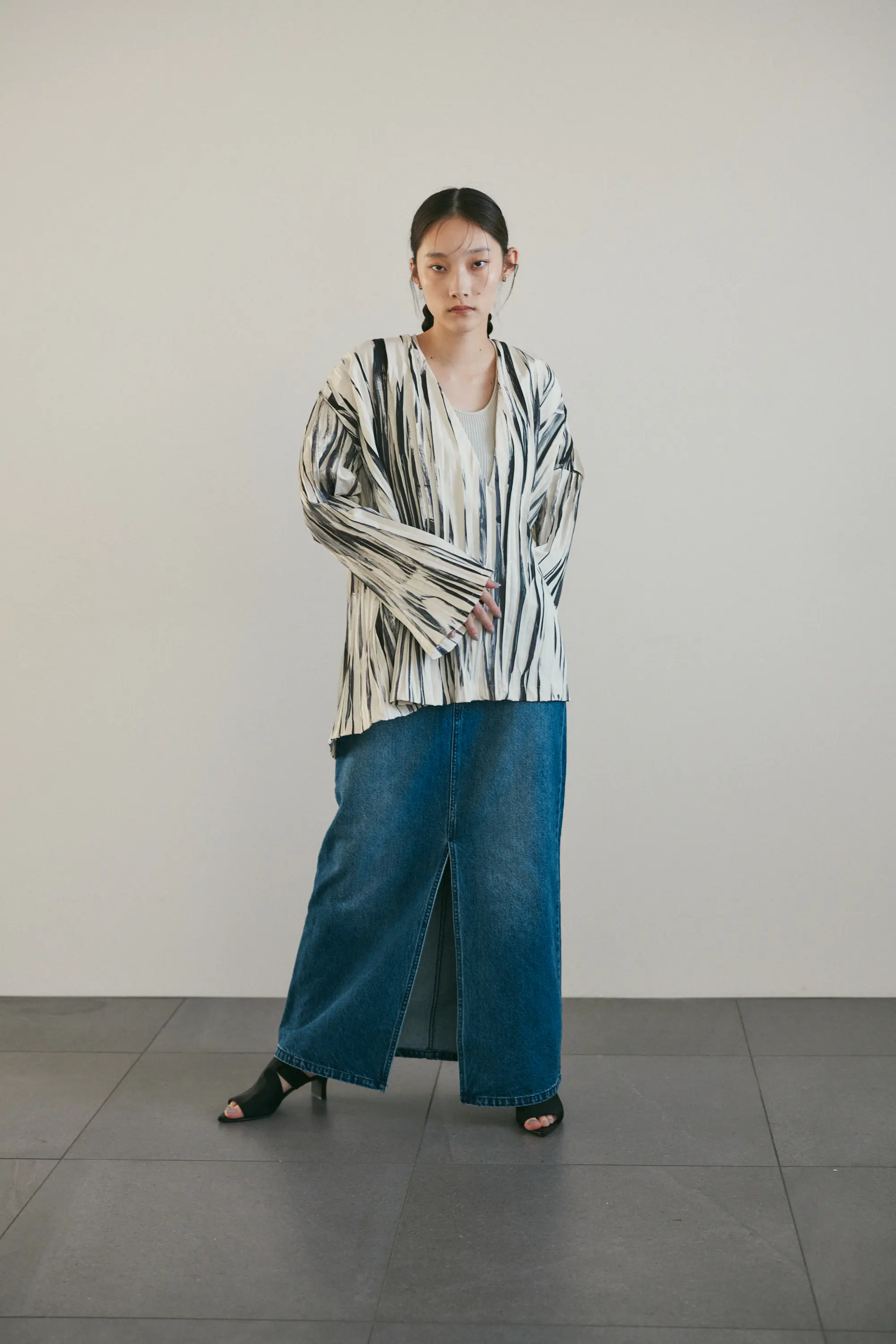 RIM.ARK（リムアーク）の「Movement pleats tops（シャツ